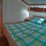 room, © Pension Kubicek A cozy room with double bed, sofa, table and window.